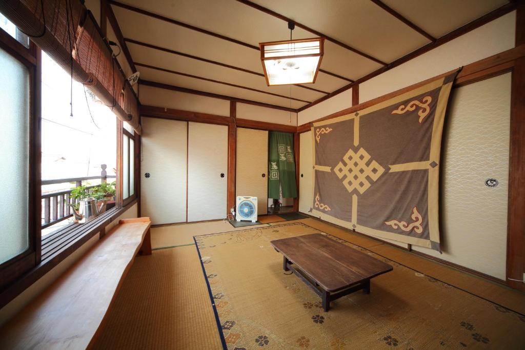 Buddha Pensión Kuchikumano Tanabe Habitación foto